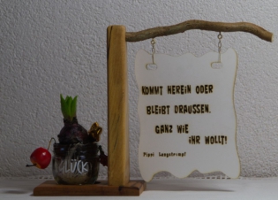 Glückständer mit Schild.